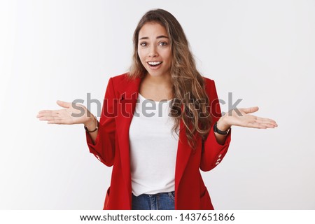 So what. Portrait of arrogant unbothered good-looking modern young stylish woman red jacket, shrugging careless hands sideways smiling gasping indifferent, telling something obvious Royalty-Free Stock Photo #1437651866