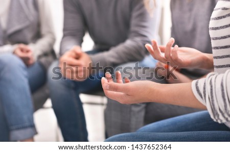 Emotional woman sharing her story during support session for addicts, close up on gesticulating hands Royalty-Free Stock Photo #1437652364
