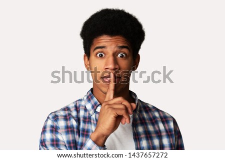 Just Don't Speak! Silent Afro Guy Making Hush Gesture, White Background