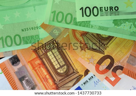 One Hundred and Fifty euro banknotes green color toned close up