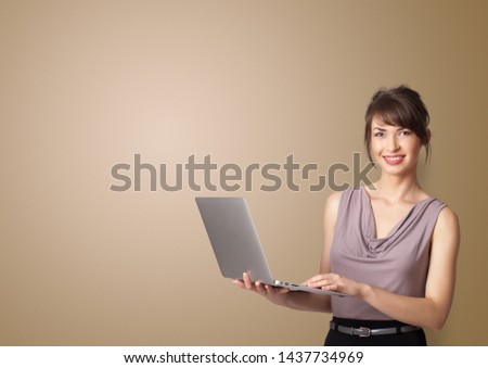 Young person presenting something with empty space