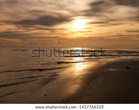sunrise on the beach at hua-hin thailand