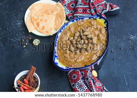 Stock photo of traditional Ramadan Dish,  boiled, cracked, or coarsely-ground wheat, mixed with meat called Hareesa