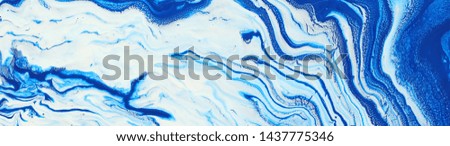 photography of abstract marbleized effect background. Blue and white creative colors. Beautiful paint. banner