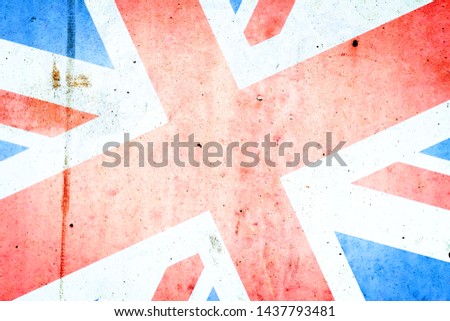 Flag of Britain on an old concrete wall. Backgrounds Textures.