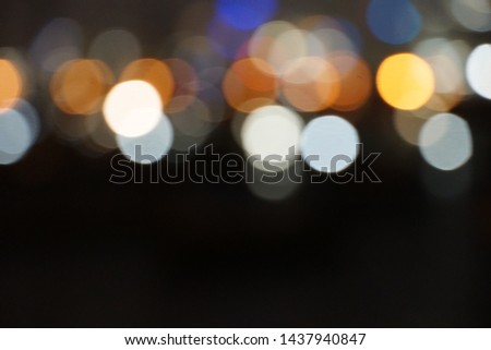 Abstract bokeh light night city and black background. Nightlife background using for card, flyer, invitation, placard, voucher, banner. Copy blank space for text.