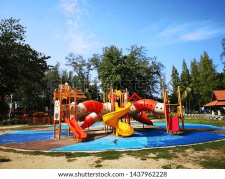 Colorful playground on yard in the park.

