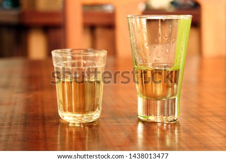 Drink in wood bar table Royalty-Free Stock Photo #1438013477