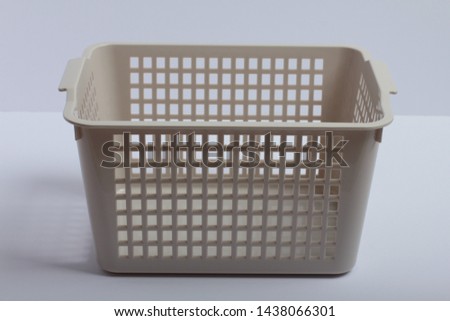 grey plastic container on white background