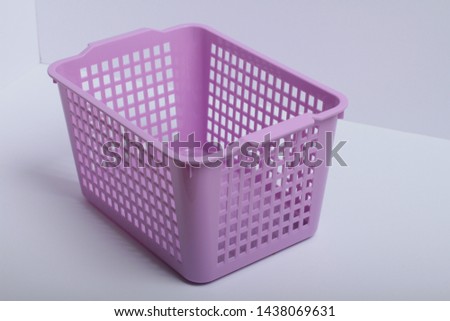 purple plastic container on white background
