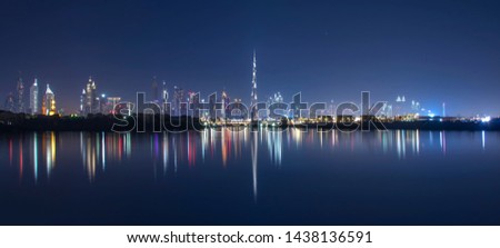 The Dubai Skyline and it's reflection.