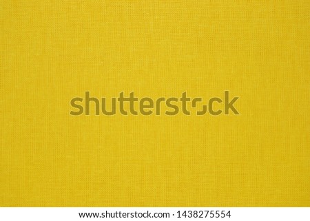 Background texture of yellow fabric close-up