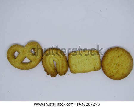 Close up view of eat butter cookies biscuits or kue mentega Brysslkex, sablès or Biskuit Denmark. Crisp made without using yeast or developers. Set jar consist of round, vanilla ring, danish, cocosina