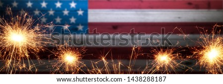Dark Vintage Wooden American Flag Background With Sparklers - Independence Day Concept