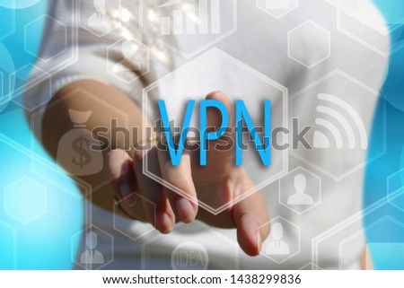 The businessman chooses  button VPN,  Virtual Private Network on the touch screen 