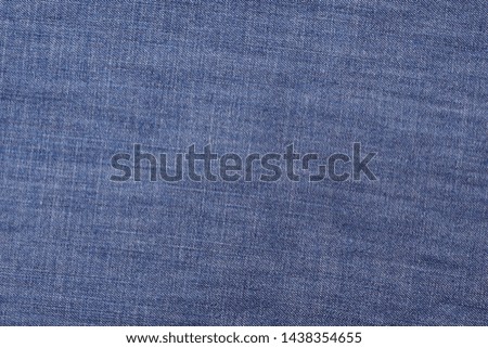 Blue denim. Cotton fabric, jeans Creative vintage background
