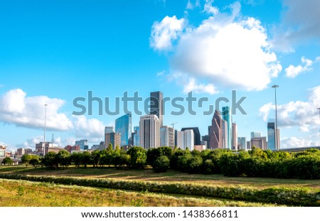 Houston skyline looking west from White Oak Bayou hike and bike trail on White Oak Bayou Houston Texas.
