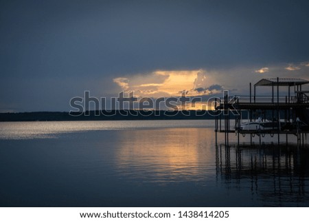 Shadowy pictures of a calm sunset over a beautiful Texas lake