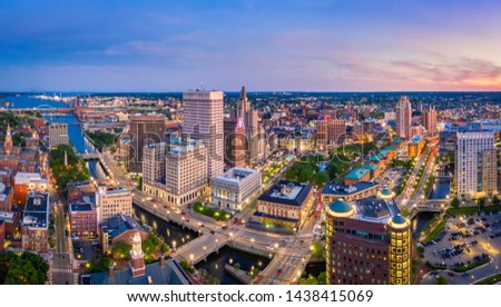 Aerial panorama of Providence skyline at dusk. Providence is the capital city of the U.S. state of Rhode Island. Founded in 1636 is one of the oldest cities in USA. Royalty-Free Stock Photo #1438415069