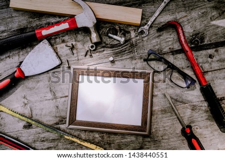 construction worker with drill. hammer and tools on wood planks with copy space. Father day. Working concept.