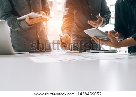 Business people analyzing investment graph meeting brainstorming and discussing plan in meeting room, investment concept Royalty-Free Stock Photo #1438456052