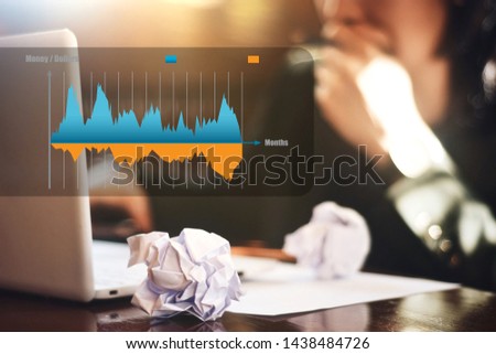 Picture of earnings chart on blur failed work action background. financial management concept