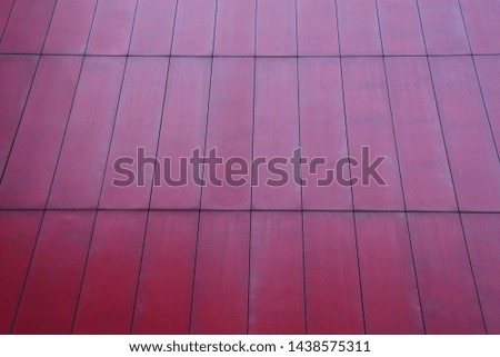 Background photo of the red tile on building design