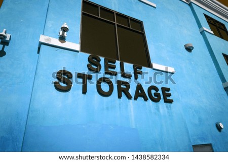 Self storage sign on building                               