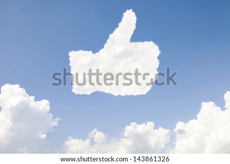 Thumb up and like concept symbol in clouds on blue sky Royalty-Free Stock Photo #143861326