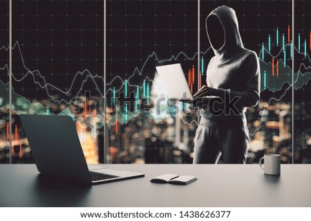 Hacker using laptop in modern office interior with supplies, coffee cup on desktop and night city view with forex chart. Trade and malware concept. Multiexposure