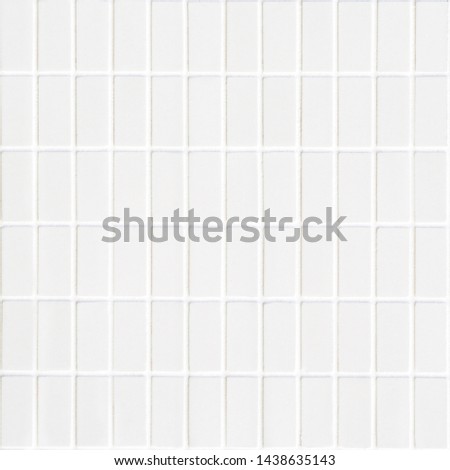 white ceramic tile with many little rectangles in square form