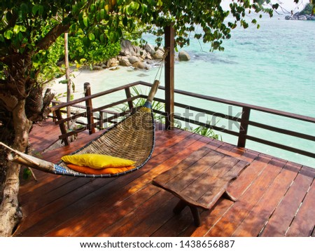 Bamboo hammock on a patio of a cafe in Koh Lipe, Thailand