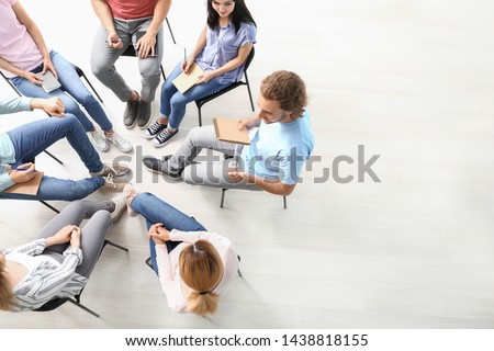 People at group therapy session Royalty-Free Stock Photo #1438818155