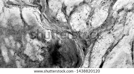 the blizzard, allegory, abstract naturalism, Black and white photo, abstract photography of landscapes of the deserts of Africa from the air, aerial view, contemporary photographic art, 