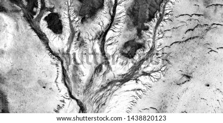 the blizzard, allegory, abstract naturalism, Black and white photo, abstract photography of landscapes of the deserts of Africa from the air, aerial view, contemporary photographic art, 
