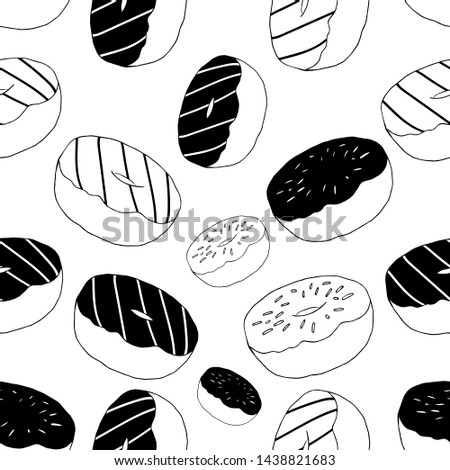 Seamless pattern made out of donuts in black and white.