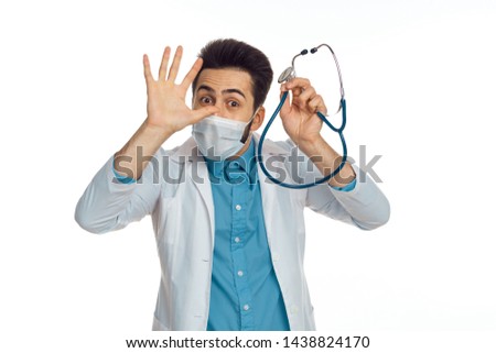    doctor with stethoscope on isolated background                            