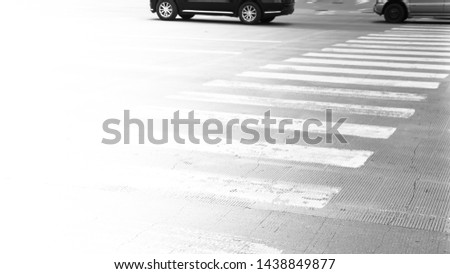blurred, Crosswalk with cars on across road.
