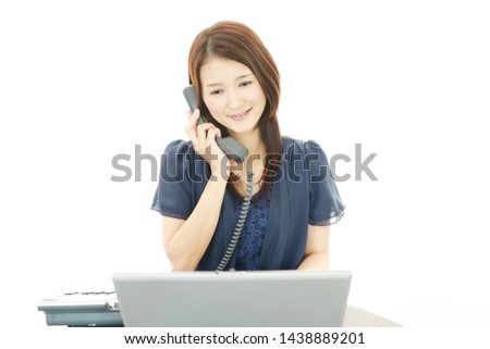 Business woman with a phone.