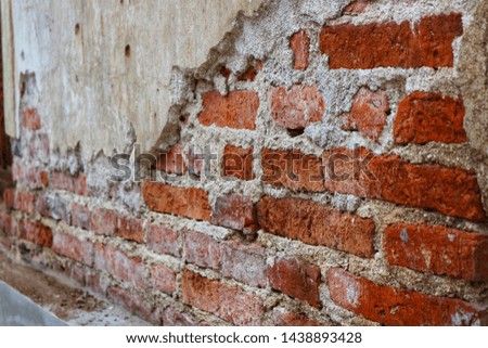 Close-up photo of red brick wall, brown, old vintage background