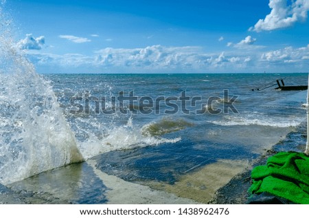 Splashing wave on the Black sea in the day.