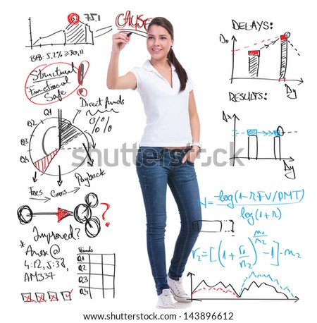 full length picture of a casual young woman writing calculations and graphs while holding her other hand in the pocket. isolated on white background