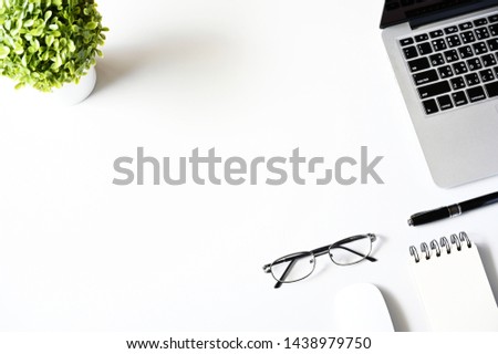 Working with Laptop computer,Hot coffee and cactus copy space on White table background.Top view,Flat lay,style Minmal workspace,business Concept