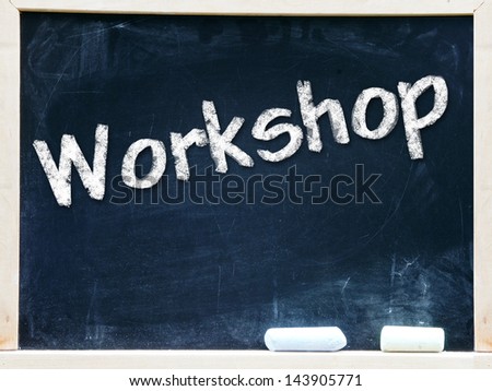 Workshop handwritten with white chalk on a blackboard