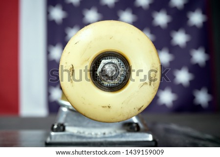 white dirty skateboards wheel on on the US flag background