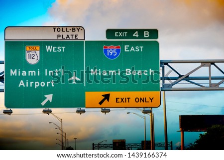 Miami Beach and Miami International Airport exit sign on 195 Interstate highway in Miami, USA