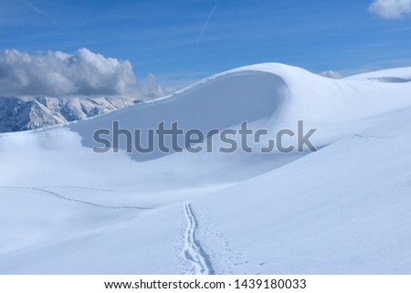 Snowy mountain in the Flaine ski resort, with a view of the Mont Blanc