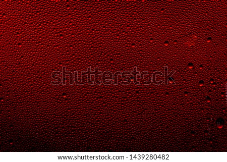 Ice cold glass fresh coca cola covered with water drops condensation Cold drink Drops of water cola drink background Raindrops texture Close up Royalty-Free Stock Photo #1439280482