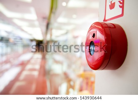 Fire alarm on the wall of shopping center.