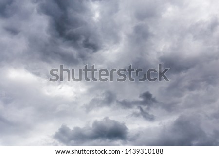 gray incoming storm clouds dark closeup backdrop